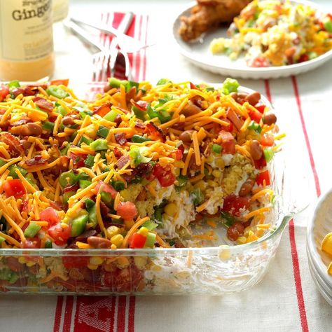 A co-worker brought this wonderful dish to a potluck several years ago. She had copies of the recipe next to the pan. Now I make it for get-togethers and also supply copies of the recipe. I never have any leftover salad or recipes. —Kelly Newsom, Jenks, Oklahoma Chili Cornbread Salad, Corn Bread Salad, Church Potluck Recipes, Chili Cornbread, Potluck Salad, Cornbread Salad, Chili And Cornbread, Church Family, Layered Salad