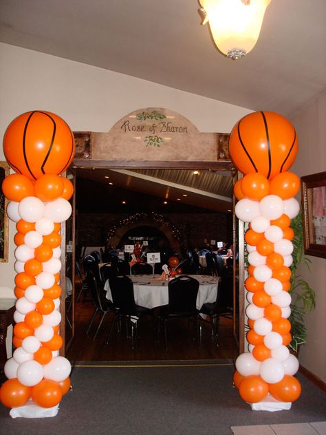 basketball party ideas | Giant basketballs atop classic columns tip of a fun banquet March Madness Parties, Basketball Theme Birthday, Basketball Senior Night, Basketball Baby Shower, Football Banquet, Basketball Theme Party, Basketball Decorations, Sports Banquet, Basketball Birthday Parties