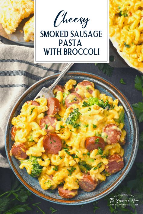 You can't beat the ease of this creamy and cheesy Smoked Sausage Pasta for a 30-minute dinner that the whole family will love. Made-from-scratch skillet mac and cheese is tossed with kielbasa and tender broccoli florets so that you get an entire meal in one pan. Cheesy Smoked Sausage Pasta, Sausage Pasta Skillet, Skillet Mac And Cheese, Sausage And Broccoli, Smoked Sausage Pasta, Pasta With Broccoli, Smoked Sausage Recipes, The Seasoned Mom, 30 Minute Dinners