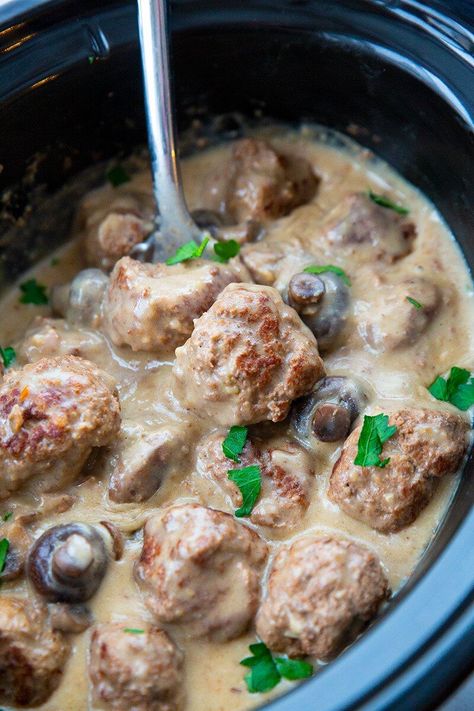 Crock Pot Meatballs with Creamy Mushroom Gravy Mushroom Soup Meatballs Crockpot, Mushroom Sauce For Meatballs, Meatballs With Mushroom Sauce, Meat Ball Crock Pot Recipes, Mushroom Soup Meatballs, Meatballs In Mushroom Sauce, Crockpot Mushrooms, Making Meatballs, Creamy Mushroom Gravy