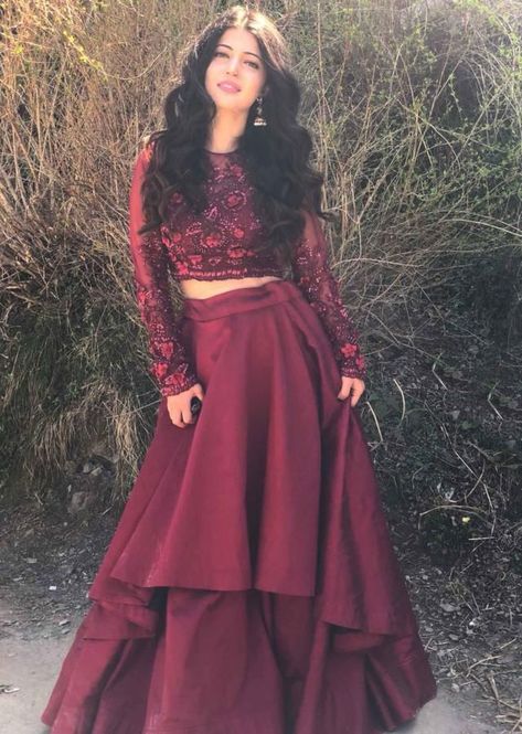 Charlie Chauhan in Kalki maroon double layer skirt with embroidered crop top blouse Crop Top Outfits Indian, Prom Dress Long Sleeves, Charlie Chauhan, Double Layer Skirt, Long Skirt And Top, Indian Outfits Lehenga, Layer Skirt, Lehnga Dress, Prom Dress Long