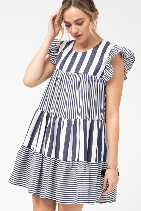 How adorable is this dress? We love the mixed stripes and ruffle sleeves. This would be so cute to wear for Easter or brunch! It is lined so it is not sheer. Fabric: 100% Poly Brand: Entro Small - 2/4 Medium - 6/8 Large - 10/12 *If you aren't busty, you could size down in this due to the flowy fit Stripes Dress, Striped Tunic Dress, Striped Tunic, Spring Summer Dress, Navy Dress, Navy Stripes, Tiered Dress, Dress 100, Dress Sleeveless