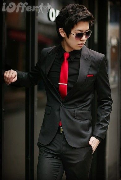 Tybalt would stand out in this classy yet catty suit. It puts a spin on the classic black tux by adding a splash of red for his sneaky intentions. Black Tuxedo With Red Tie, Black Tux Red Vest, Black Suit Red Tie Aesthetic, All Black With Red Tie, Black Suit Dark Red Tie, Black Suit White Shirt Red Tie, Black Tux Red Bow Tie, Red And Black Prom Suits For Guys, Black Suit Red Tie Prom