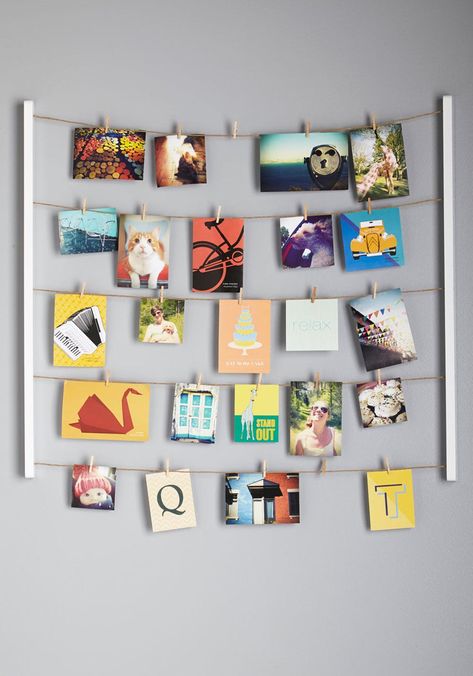 Save a Wall, Hang a Poster: 16 Ideas for Alternative Art Display | Brit + Co Studio Seni, Photo Hanger, Metal Tree Wall Art, Hanging Photos, Metal Tree, Time Photo, Dorm Room Decor, Clothes Line, Rustic Chic