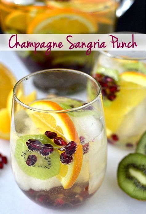 Champagne Sangria Punch is fizzy, just sweet enough, and spiked with fresh fruits. The perfect cocktail for the holidays! | Iowagirleats.com Sangria Thanksgiving, Sangria Christmas, Sangria Fall, Sangria Summer, Champagne Sangria, Pomegranate Sangria, Sangria White, Thanksgiving Sangria, Easy Sangria