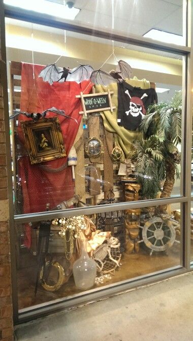 Pirate Woof-O-Ween 2015 #window display at #odysseypets Pirate Window Display, Davy Jones Locker Halloween, Pirate Book Fair Theme, Pirate Display Board, School Display Case, Pirates Photo Booth, Pirates School Theme, Display Case Ideas, Charity Shop Display Ideas