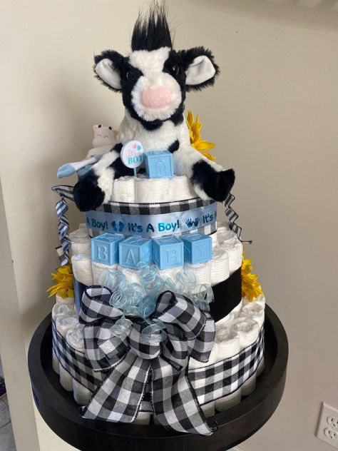 Cow Diaper Cake Baby Boy, Baby Boy Farm Shower Ideas, Farm Themed Baby Shower Ideas Boys, Cow Boy Baby Shower Ideas, Baby Shower Ideas Cow Theme, Farm Baby Shower Theme Boys, Cow Baby Shower Centerpieces, Cow Baby Shower Theme Boys, Baby Farm Animals Shower Ideas