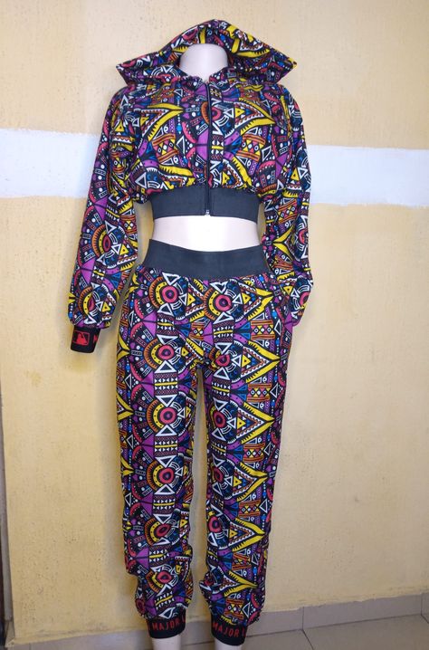 Hoodie crop top and pant Ankara Skirt Styles Classy, Ankara Hoodie, Crop Top And Trouser, Agbada Design, Hoodie Crop Top, African Attire Dresses, Ankara Clothing, African Shirts For Men, 2piece Outfits