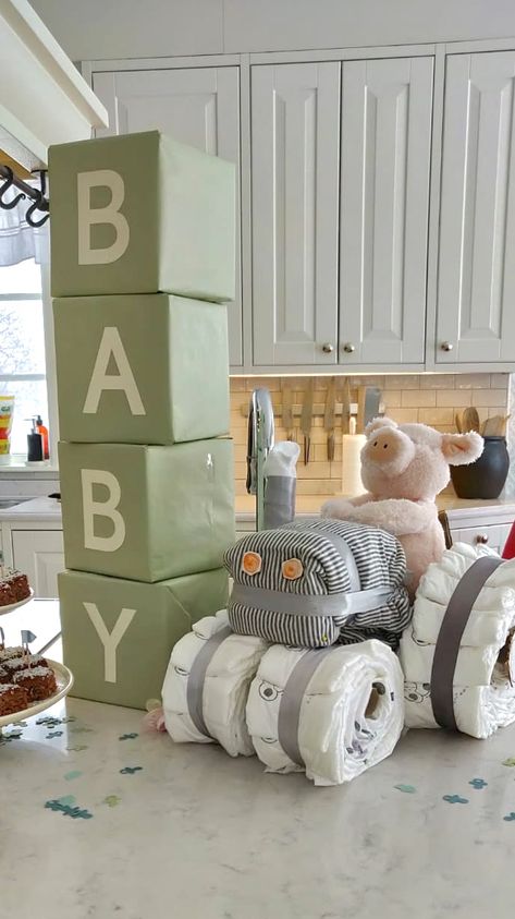 Baby blocks and nappy tractor Baby Boy Farm Shower Ideas, Farm Fresh Baby Shower Theme, Tractor Theme Baby Shower Ideas, Farmer Baby Shower Ideas, Tractor Gender Reveal, John Deere Baby Shower Ideas, Farm Baby Shower Ideas, Tractor Baby Shower Ideas, Farm Theme Baby Shower Ideas