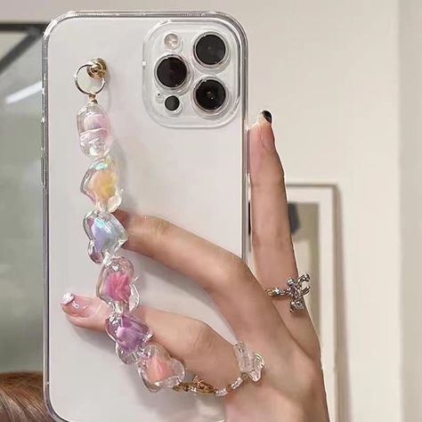 A clear case with a chain attached with clear and colorful hearts. Cute Love Heart, Jelly Case, Modern Heart, Heart Chain, Hand Strap, Clear Iphone Case, Crystal Chain, Hand Chain, Cute Cases