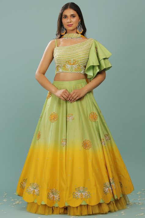 Featuring a green and mustard ombre lehenga in opada silk base with frills. It is paired with a matching green one-shoulder blouse having pearl, sequins, and mirror embroidery and a choker net dupatta.  FIT: Fitted at bust and waist. COMPOSITION: Opada silk, Net.  CARE: Dry clean only. Frilled Lehenga, Ombre Lehenga, Mirror Embroidery, Anarkali Dress Pattern, Frill Blouse, New Address, Embroidery Designs Fashion, Wedding Lehenga, Net Dupatta