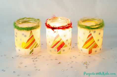 Kids will love making these magical Christmas lanterns! They look absolutely stunning lit up with a candle inside and would make the perfect addition to any holiday decor. #christmascrafts #christmaslanterns #kidschristmas #projectswithkids Christmas Lanterns Ideas, Diy Christmas Lanterns Ideas, Mason Jar Christmas Decorations, Diy Christmas Art, Christmas Art Projects, Christmas Arts And Crafts, Fun Christmas Crafts, Christmas Mason Jars, Kids Projects