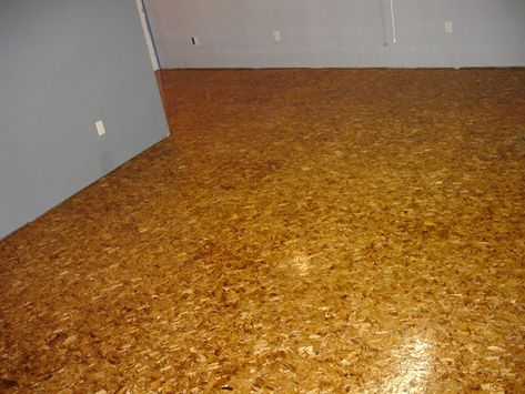 osb flooring stained and varnished | Forum | Archinect Particle Board Floor, Osb Plywood, Osb Wood, Inexpensive Flooring, Osb Board, Cheap Flooring, Modern Flooring, Floor Stain, Plywood Flooring