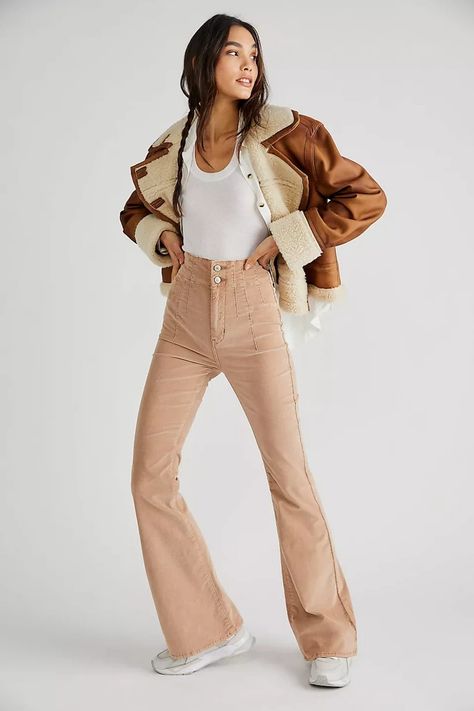 42 Snuggly Free People Styles We're Loving For Winter - Brit + Co Free People Firecracker Jeans, Firecracker Jeans, Cord Flares, Longline Sweater, Jeans Free People, Flare Jumpsuit, Chocolate Truffle, Free People Style, All Jeans