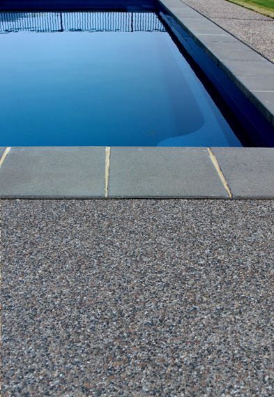 Yarra Exposed Aggregate Mix - Poolside  www.mawsons.com Exposed Aggregate Pool Deck, Exposed Aggregate Pool Surround, Stone Decking, Polished Concrete Pool Surround, Exposed Aggregate Pool, Cement Pond, Around The Pool Landscaping, Pool Concrete, Bluestone Coping Around Pool