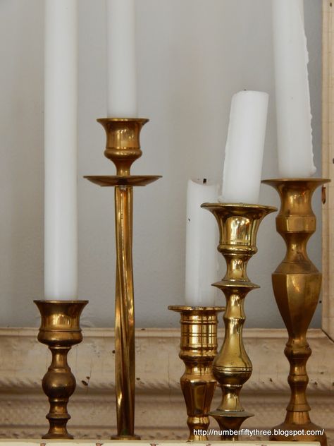 Brass Candlesticks On Mantle, Decorating With Brass Candlesticks, Brass Candlesticks Mantle, Brass Candlesticks Decor, Candlestick Display, Multiple Candle Holder, Display Collections, Black Candlestick Holders, Candlestick Collection