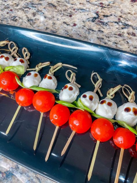 Halloween is just around the corner, and it’s time to start planning the spookiest, most delicious treats for your upcoming party. While candies and chocolates are always crowd-pleasers, why not surprise your guests with a savory and eerie twist on... Read More The post Spooky Delights: How to Make Caprese Skewers for a Halloween Party first appeared on Helen G. Bailey. The post Spooky Delights: How to Make Caprese Skewers for a Halloween Party appeared first on Helen G. Bailey. Halloween Caprese Skewers, Halloween Skewers, Halloween Caprese, Halloween Party Planning, Caprese Skewers, Halloween Post, Basil Leaf, Delicious Treats, Roasted Red Peppers