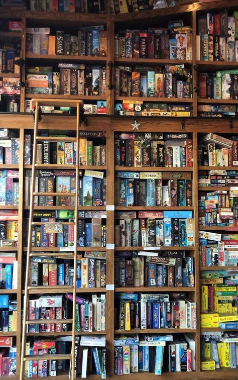 Board Game shelves Board Game Library Room, Board Game Room Decor Ideas, Board Game Living Room Ideas, Bookshelves Board Games, Aesthetic Board Game Storage, Game Shop Aesthetic, Board Games Shelf, Board Game Library, Board Game Shop