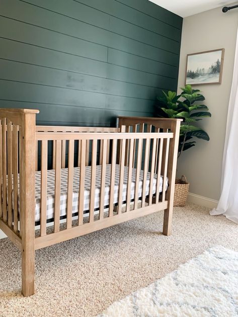 Nursery With Dark Accent Wall, Shiplap Wallpaper Nursery, Brick Accent Wall Nursery, Grey Room With Green Accent Wall, Dark Green Nursery Wall, Shiplap Wall Green, Neutral Wood Nursery, Grey Walls With Green Accent Wall, Green Black Nursery