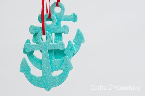 Create easy coastal ornaments on a budget. For my coastal theme Christmas tree I made these simple DIY ornaments with just some paint, glitter and anchors! Beachy Christmas Tree, Ornaments Simple, Theme Christmas Tree, Wooden Christmas Tree Ornaments, Coastal Ideas, Beach Christmas Trees, Beach Themed Crafts, Beach Christmas Ornaments, Coastal Ornament