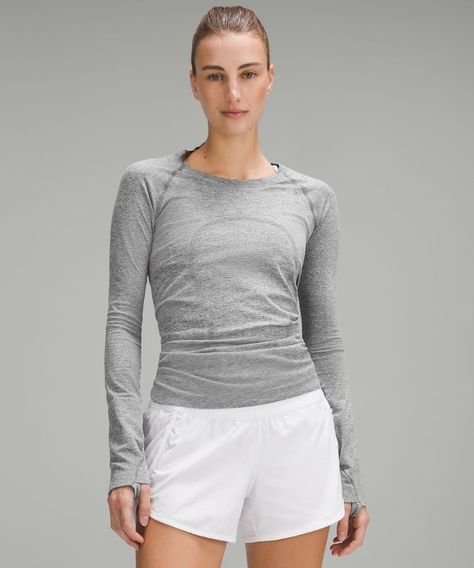 Go ahead, get sweaty. The Swiftly Tech collection, powered by seamless construction, is the ultimate gear for running and training. | lululemon – Women's Swiftly Tech Long-Sleeve Shirt 2.0 – Color White/Grey – Size 20 Lululemon Swiftly Tech Long Sleeve, Swiftly Tech Long Sleeve, Lululemon Shirt, Lululemon Long Sleeve, Lululemon Swiftly Tech, Lululemon Swiftly, Garment Fabric, Swiftly Tech, Lululemon Women