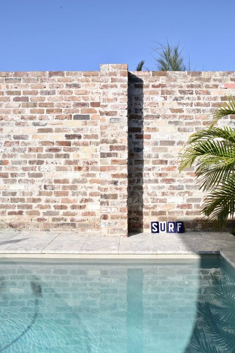 Reclaimed Brick Wall, Blue Haven Pools, Clinker Brick, Travertine Pool, Red Brick Wall, Recycled Brick, Reclaimed Brick, White Pebbles, White Cement