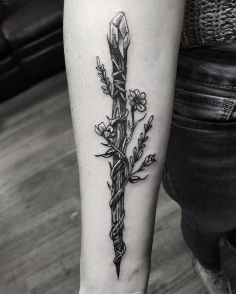 #tattoos #tattooideas #blackandwhite #blackworktattoo  #wandtattoo #harrypotter #flowertattoodesigns #witchcraft #witchywoman Smudge Tattoo Design, Wand With Flowers Tattoo, Witchy Cottagecore Aesthetic Tattoos, Witch Wand Tattoo, Witch Tattoo Filler, White Witch Tattoo, Witchcraft Tattoos Ideas, Tattoos Freedom, Witch Aesthetic Tattoo