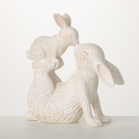 Now you can add a special springtime touch to any surface with this precious decorative bunny and baby pair. This adorable figurine is ready greet the season and stay on display all summer long. Touching noses, this delightful dainty accent will be a cherished decoration you'll pull out year after year. Over the last 55 years, Sullivans has become an industry leader in home decorations. Our brand is rooted in tradition while incorporating modernized trends to keep your home looking up to date wi Bunny Figurine, Easter Season, Baby Bunnies, Pink Accents, Seasonal Gifts, Imaginative Play, Cute Bunny, On Display, Easter Decorations