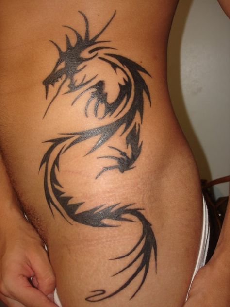 Side dragon tattoo Dragon Tattoo On Side, River Dragon, Tattoo Ladies, Body Henna, Woman Tattoos, River Tattoo, Red Dragon Tattoo, Dragon Tattoos For Men, Tattoo Diy