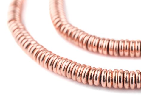 PRICES MAY VARY. Take a look at this great strand of Copper beads fashioned in a heishi shape. Each strand is 16" long with approximately 270 beads measuring 1.5 x 5mm. These great beads are highly versatile and may be used as spacers or accents in your unique designs. A great addition to your beading toolkit! Please note: a large majority of The Bead Chest products are handmade. Therefore, the tone, brightness, and/or color of the product received may vary from the photo. Additionally, any size Beaded Designs, Recycled Glass Bead, Cpr, African Beads, Wood Rings, Heishi Beads, Trade Beads, Creative Jewelry, Beading Supplies