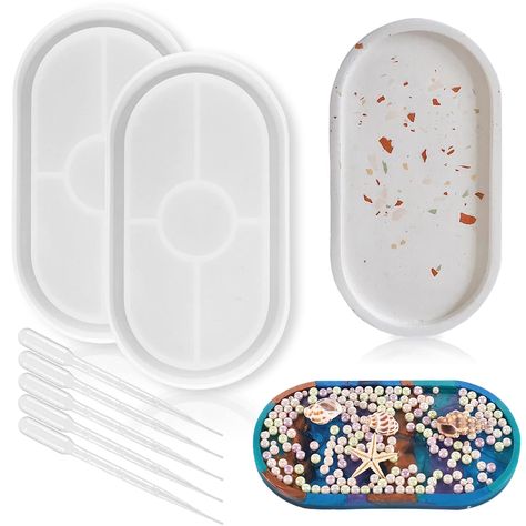 PRICES MAY VARY. 7 PIECES TRAY RESIN MOLD KIT – There are 2 pieces silicone oval tray molds + 5 pieces eye droppers for epoxy resin, 7 pieces in total. RESIN GREAT TOOLS – 5 pieces eye droppers assist you when details needed to be made when modeling. CATCHALL TRAY DIY MOLD – Tray mold is very easy to use. Just put mixed concrete, jesmonite ,or terrazzo material into mold, wait for 1 day to demould, beautiful plate you will get. PREMIUM QUALITY - It is sturdy , soft, with quality silicone raw mat Epoxy Resin Crafts Silicone Molds, Jesmonite Tray, Tray Resin, Clay Making, Making Candles, Diy Tray, Catchall Tray, Tray Diy, Resin Tray