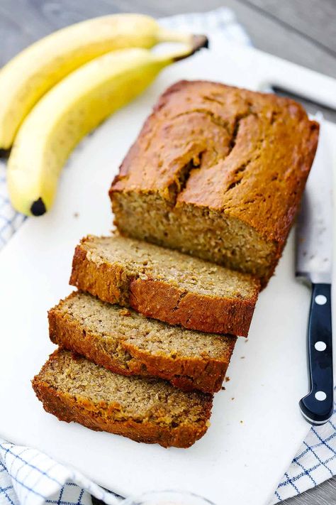 This Healthy Banana Bread recipe is SUPER moist, made with four bananas, extra-virgin olive oil, and whole wheat flour! #bananabread #oliveoil #healthyrecipes Banana Bread With Oil, Healthy Banana Bread Recipe, Banana Oat Muffins, Banana Bread Recipe Healthy, Banana Bread Recipe Moist, Moist Banana Bread, Easy Banana Bread Recipe, Healthy Banana Bread, Healthy Banana