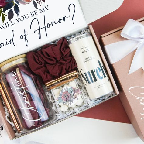 ciding who is going to be in your bridal party can be a tough decision. Finding the perfect way to propose shouldn’t be! We know how important and special you want that moment to be. Our Blue Rose gift box is the perfect way to ask them to stand by your side. Made with the highest quality products, attention to detail, and let's be honest, a bit of perfection. This gift will have them yelling “YES” when they receive it! Burgundy Bridesmaid Proposal, Will U Be My Bridesmaid, Burgundy Bridal Party, You're The Balm, Bridal Gift Box, Will You Be My Bridesmaid Gifts, Forest Theme Wedding, Vanilla Lip Balm, Rose Gold Bridesmaid