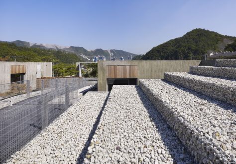 Hanil Visitors Center & Guest House – BCHO Architects Bcho Architects, Gabion Cages, Visitors Center, Landscape Structure, Photo Room, Modern Landscape Design, Landscape Materials, Information Center, Retaining Walls