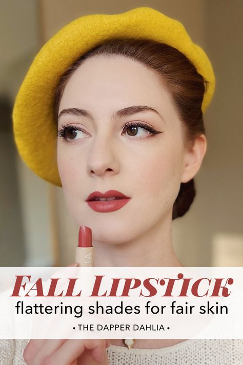 Woman with red hair and fair skin wearing a yellow beret and holding a tube of lipstick by Ilia. Fall Lip Colors For Fair Skin, Fall Lipsticks For Fair Skin, Dark Autumn Lipstick Palette, Lipstick For Pale Skin Brunettes, Fall Makeup For Fair Skin, Berry Lipstick For Fair Skin, Brown Lipstick For Fair Skin, Red Lipstick For Soft Autumn, Warm Autumn Lipstick Colors