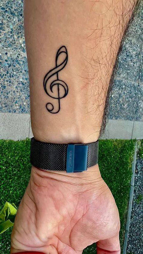 20 Trendy Small Tattoo Ideas for Men in 2023 - Fall Update 2024 Hand Music Tattoo, G Music Note Tattoo, Treble Clef Tattoo Men, Music Symbol Tattoo Men, G Key Tattoo, Music Back Tattoo, Small Music Related Tattoos, Tato Music, Note Tattoo Music