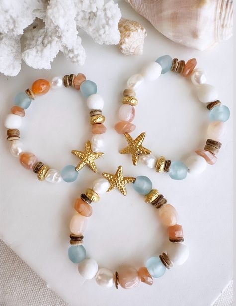 These one of a kind beautifuly ornate beach inspired bracelets was definitely designed for the beach lover accenting a beautiful gold starfish with stunning blue seaglass beads and sunset orange sunstone will definitely give all the beachy vibes when you wear this bracelet. These handcrafted bracelets are all one of the kind bracelets, so once they are gone they are gone.  This bracelet features:  1 bracelet size 7" stretch style  Unique Antique gold brass gold filled coated  blue and white sea