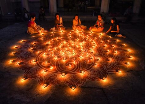 Diwali Festival at India. Family members of Bholanath Dham Dutta Bari decorate their lawn with soil made Diyas during Diwali in Kolkata. India as a part of the royalty free stock images History Of Diwali, Diwali 2022, Diwali Photos, Diwali Diya, Diwali Party, Diwali Images, Diwali Rangoli, Rangoli Designs Diwali, Diwali Celebration