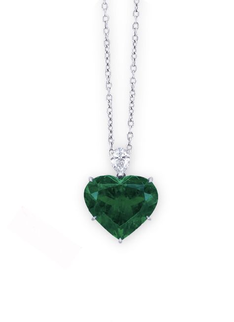 AN EMERALD AND DIAMOND PENDANT NECKLACE. The pendant set with a heart-shaped emerald weighing 10.05 carats, surmounted by a pear-shaped diamond, mounted in platinum. Heart Shaped Emerald Necklace, Jewellery Portfolio, Emerald Necklaces, Heart Shaped Diamond Necklace, Magnificent Jewels, Sparkly Necklace, Pretty Jewelry Necklaces, Fancy Rings, Heart Pendants