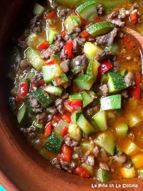 Beef with Calabacitas (Squash) - La Piña en la Cocina3 tablespoons of grapeseed or olive oil 1 1/2 pounds of thinly sliced chuck steak or ground beef Salt and pepper to taste 1 small white onion diced 3 cloves garlic minced 3 serrano peppers 1 red bell pepper diced 3 roma tomatoes roughly chopped 1/2 tsp oregano 2 cups water 2 teaspoons beef bouillon 2 full cups calabacitas or zucchini diced handful of cilantro Calabacitas With Ground Beef, Calabaza Recipe, Calabacitas Recipe, Chicken Squash, Budget Bites, Mexico Recipes, Authentic Mexican Recipes, Copykat Recipes, Space Kitchen