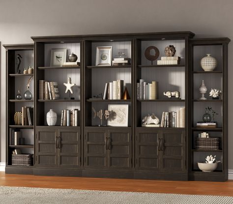 Parker House Shoreham PKH-SHO435-MDR-HOF-S1, This 24 inch wide bookcase provides the perfect blend of style and functionality. The gorgeous medium roast brown finish over birch veneers is contrasted by a effortless white finish and accented with burnished nickel hardware, creating a unique and eye-catching piece that is sure to elevate any room. The back panels can be reversed for two distinct looks, and the removable side crown moldings allow bookcases to be bunched together for a more customiz Top Of Bookcase Decor, Office With Built In Bookshelves, Modern Library Room, Office Shelving Ideas, Moody Den, Peninsula Desk, Bookcase Ideas, Wide Bookcase, Office Bookshelves