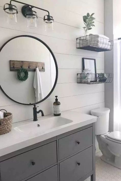 Check out these 19 amazing decor ideas for your farmhouse bathroom! From lighting to shelves to the floor, this blog has all the advice you need to design your rustic farmhouse paradise.................| Mirror | Tile | Colors | Vanity | Shower | Modern | Master | DIY | Joanna Gaines | Sink | Remodel | Tub | Storage | Curtains | Signs | Kids | Industrial | Paint | Shiplap | Makeover | Rugs | White | Gray | Vintage | Towel Rack | Lily Ann Blogs Tub Storage, Sink Remodel, Wc Decoration, Small Farmhouse Bathroom, Tub Remodel, Shower Modern, Tile Colors, Mirror Tile, Mirrors Bathroom