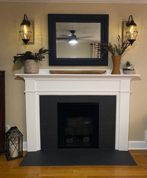 Wood Fireplace Painting Ideas, How To Paint A Fireplace Mantle, Paint Old Fireplace, Repainting Fireplace Mantle, Fireplace Mantle Redo, Fireplace Paint Tile, White Fireplace Makeover, Painted Black Tile Fireplace, Diy Painted Fireplace Tile