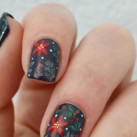 Nail Art by Amber on Instagram: "Christmas floral. This one was such a struggle, and I ended up having to design it in two days, but it was worth the extra work. I'm quite happy with how these turned out. . . . Products Used: @zoyanailpolish 'Brett', 'Wyatt' 'Snow White', 'Tanya', 'Bevin', 'Naked Manicure' Glossy top coat . @uberchicbeauty 'Satin Brass' stamping polish . 5mm nail art brush . @orly Short Detailer brush . Dotting Tool . . . . . #nails #nailart #naildesigns #christmasnailart #christmasfloral #poinsettia #christmasnails #holidaynails #cozychristmas #nailstagram #nailinstagram #glossynails #floralnails #nailartist #freehand #amber_nailart" Poinsettia Nails, Dotting Tool, Nail Art Brushes, Christmas Nail Art, Floral Nails, Christmas Floral, Cozy Christmas, Satin Brass, Holiday Nails