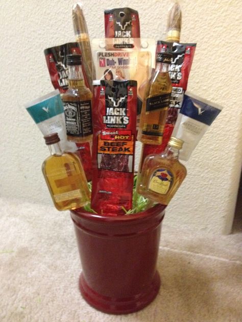 My Valentine's Day creation... a Man Bouquet with beef jerky, whiskey, cigars, and some other fun extras Beef Jerky Valentine Gift Ideas, Beef Stick Bouquet, Jerky Bouquet Diy Gifts, Diy Beef Jerky Bouquet, Snack Basket Ideas For Men, Diy Beef Jerky, Beef Jerky Bouquet, Bouquet Diy Gift, Best Beef Jerky