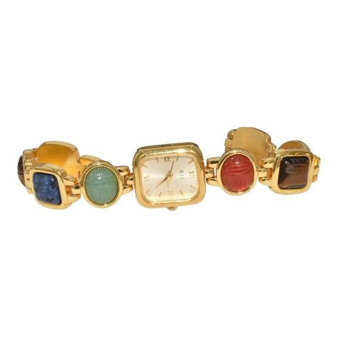 Shop infinia's closet or find the perfect look from millions of stylists. Fast shipping and buyer protection. This vintage Kenneth J Lane wristwatch bracelet features beautiful carved scarab stones set in gold tone metal. Excellent condition. Length 7.75 inches with a fold over clasp. Watch runs. Just installed new battery. Clean crystal with no scratches. One scratch on back of bracelet and a few tiny ones on watch back from battery changes. Other than that this watch looks brand new. Please Ar Accessories, Cell Phone Holster, Vr Headset, Watch Bracelet, Two Tone Watch, Walker Boots, Kenneth Jay Lane, Fit N Flare Dress, Rain And Snow Boots