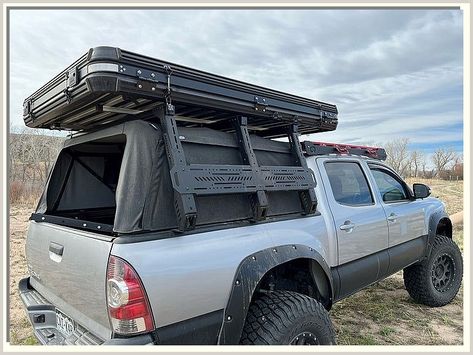 The Fj Cruiser rooftop tent is perfect for camping trips and outdoor activities. It is spacious and has a waterproof and breathable membrane. Tacoma Bed Rack, 2018 Tacoma, Overland Tacoma, Bed Side Rails, Bed Rack, Cap Rack, Trailer Tent, Truck Tent, Tacoma 2005