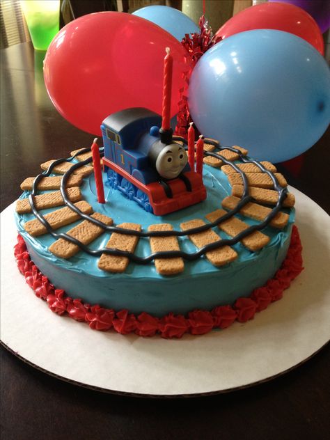 Thomas the Train birthday cake.  I usually shy away from a character birthday, but I actually love this cake.  AND I could do it myself. Train Birthday Cakes, Thomas The Train Birthday Cake, Thomas Train Birthday, Thomas The Train Birthday, Thomas Train Cake, Thomas Birthday Parties, 4de Verjaardag, Thomas Cakes, Thomas The Train Birthday Party