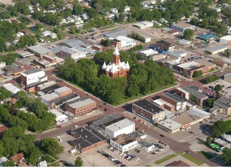 The town is built up around the historic Hamilton County courthouse. From this angle you can really see the natural beauty and classic small-town layout of the town. Town Layout, Cypress Grove, Town Building, Amazing Minecraft, Historic Preservation, My Town, Community Events, Out Of This World, City Skyline