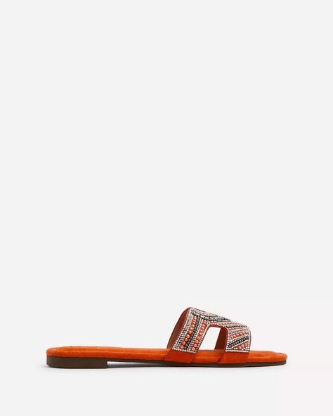 INDIRA Orange Suede Aztec Design Embellished Slider Sandal. Luxurious faux suede flat slider sandal adorned with an exquisite Aztec design diamante embellishment on the front strap. Ideal for the Summer season and your next holiday, with a padded insole for ultimate comfort. #urbanic #urbanicindia #urbanicslippers #urbanjutti #urbanjutties #urbansliders #urbansandals Slider Sandals, Shoes Flats Sandals, Aztec Design, Aztec Designs, Suede Flats, Next Holiday, Summer Sandals, Summer Season, Flat Sandals